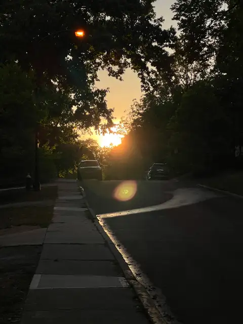Sun-kissed streets and a sky on fire.